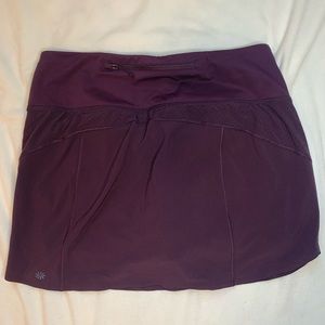 Athleta tennis shirt in dark purple